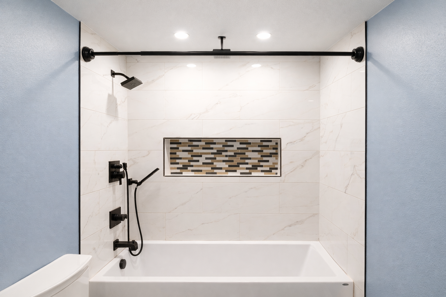 Shower with blue accent walls